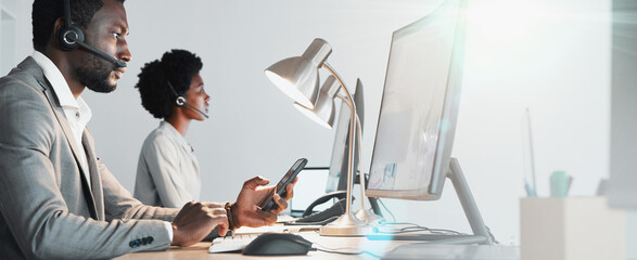 Customer support team working at computers